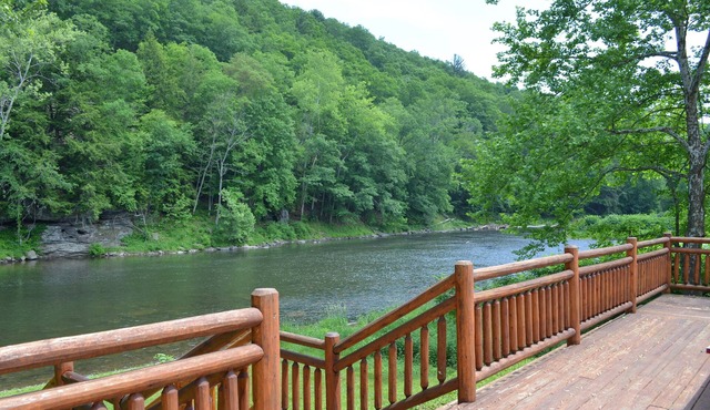 Spectacular Catskill Mountain River Front Custom Log Home