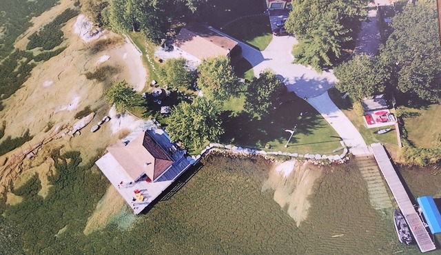 Spectacular Lakefront Cottage Retreat on Lake Couchiching sitting on 3/4 acres.