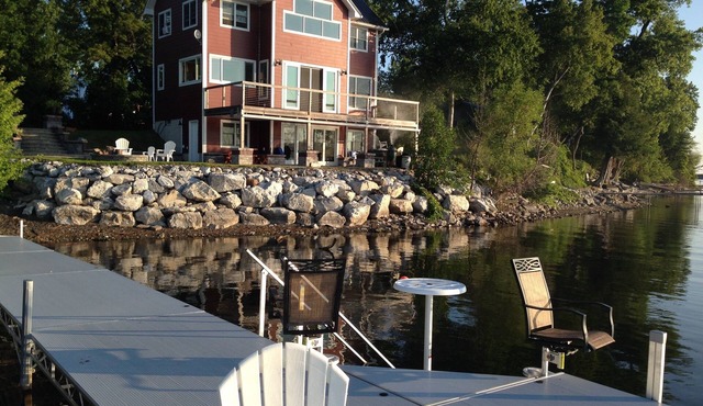 Spectacular Lakefront Home With Patio, Fire Pit, Large Dock and Work Booth.