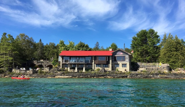 Spectacular views- Stone Cottage, steps to the water, heated pool, pet friendly
