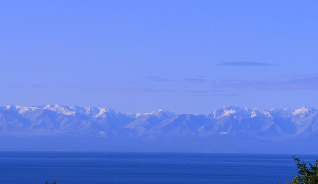 Spectacular West side views of Strait, Olympics, Victoria, south to Mt Rainier.