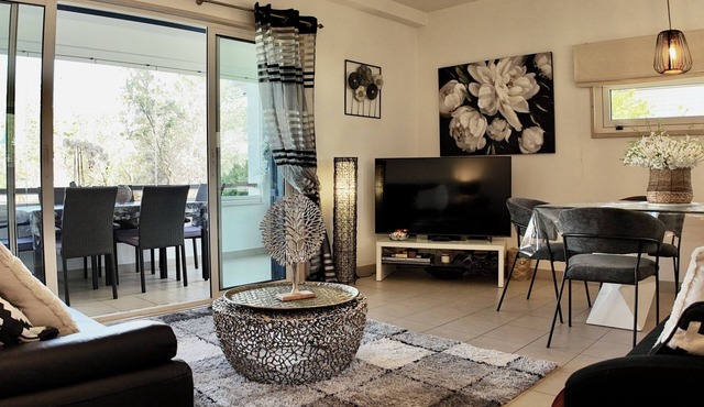 Splendid apartment with covered terrace, shared pool, WIFI, Air-Cond