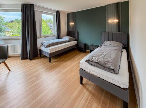 Stadtwald Apartment - S-Bahn Direct - 5min Essen HBF - Barrier-Free - WiFi
