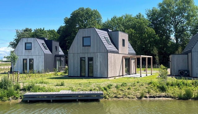 Stay in comfort in this modern, recently built holiday home with a beautiful view of the water from