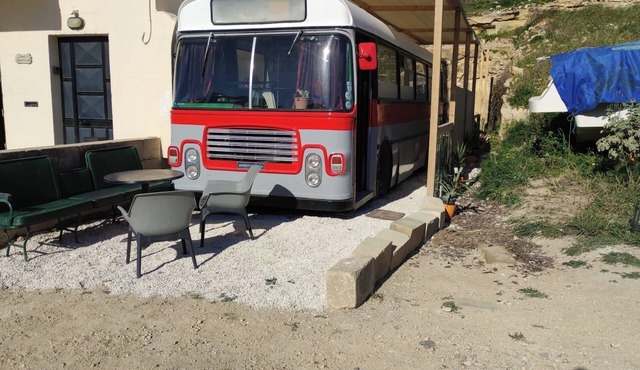 Stay on a vintage 1974 Maltese bus in Xaghra