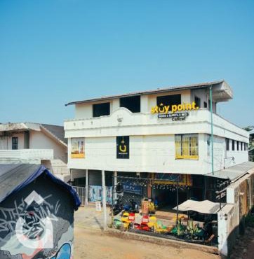 Stay Point Premium Capsule and Rooms in Calicut Beach