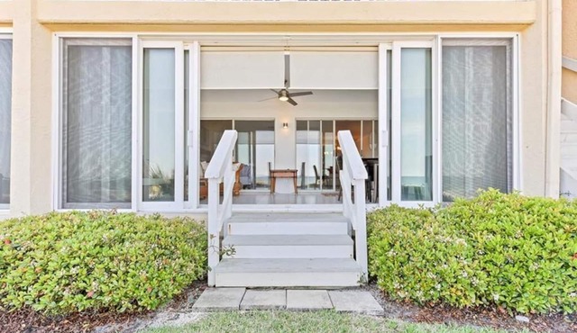 Step right on to the beach from this 2BR/2BA ground floor condo located in Retreat V