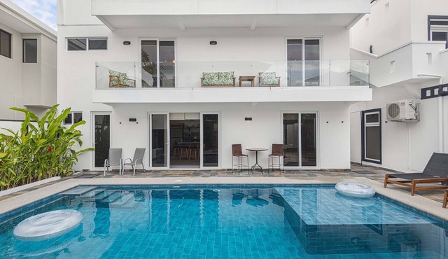 Steps from beach with private pool, rooftop terrace & swim up bar beach club!