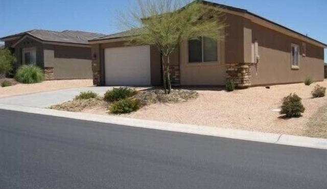 Stone Haven Home w/ Virgin Mountains views & Backyard Entertainment Area