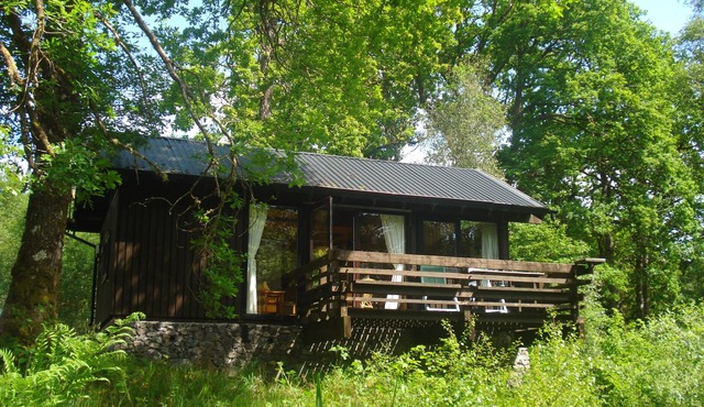 Strae is a Charming Log Cabin, Deep in the Forest, by a Babbling Burn.