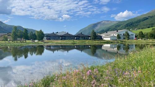 Strandhus i idylliske omgivelser