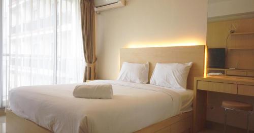 Strategic Studio Apartment at Beverly Dago with Mountain View By Travelio