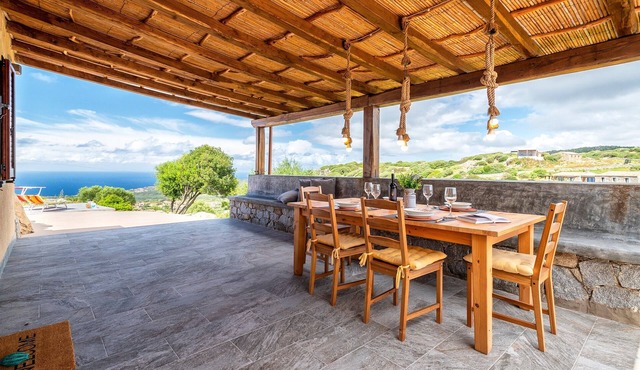 Studio Apartment 'Sa Domo Isola Rossa' with Sea View, Private Terrace and Air Conditioning