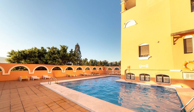 Studio Apartment 'Estudio En La Playa' with Mountain View, Shared Pool and Wi-Fi