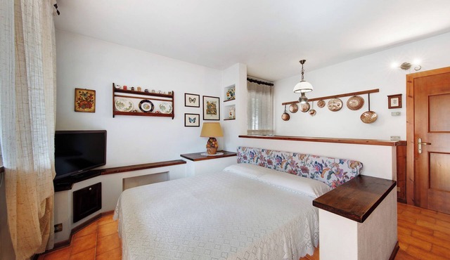 Studio Apartment 'Monolocale Monti Pallidi' with Mountain View, Private Terrace and Shared Garden