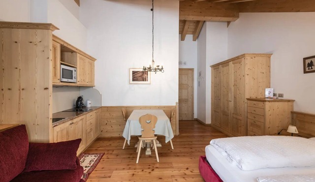 Studio Apartment 'Appartamento Mono 3 - Marmolada' with Mountain View, Shared Garden and Wi-Fi