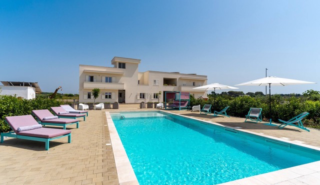 Studio Apartment "Le Scuderie 9" with Balcony, Shared Pool & Wi-Fi