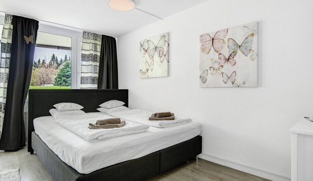 Studio Apartment "Schmetterling" near Slopes with Shared Pool & Wi-Fi
