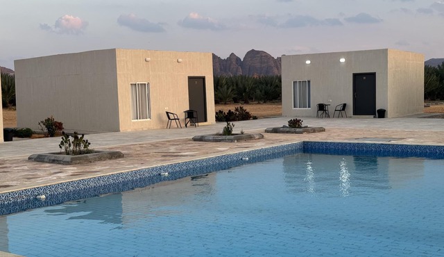 Studio overlooking pool amid flowering and quiet