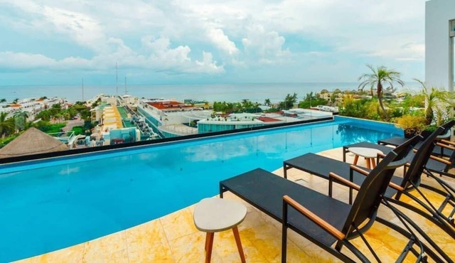Studio with AC Kitchen Pool Gym and Rooftop view