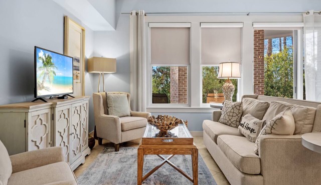 Stunning 2BR Bahia Condo at Wharf! Beach Tram, Tropical Pool, Hot Tub, Patio.