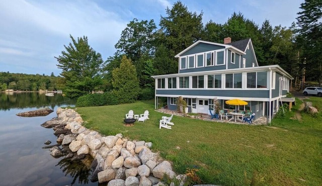 Stunning lakefront home with 270° water views and private beach near Acadia