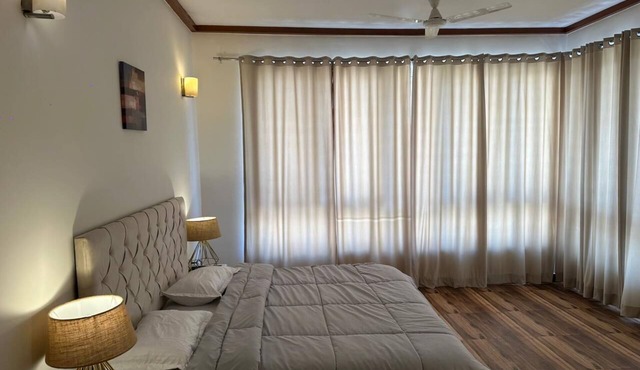 Stunning Modern Spacious Two Bedroom Apartment with Breathtaking Golf View