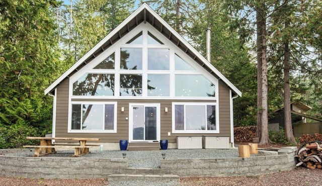 Stunning ocean-view home with private waterfront, viewpoint deck & fireplace
