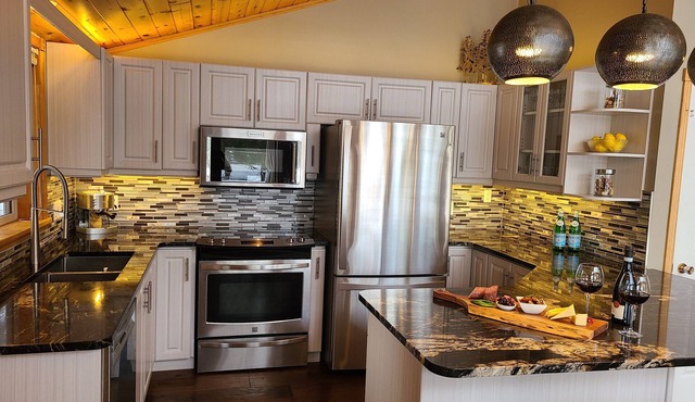 Stunning private beach and newly renovated, four-season, lakefront cottage