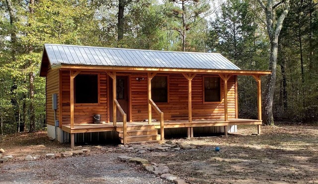 Stunning Riverfront Log Cabin Nestled Amidst Trees in Nashoba, Oklahoma