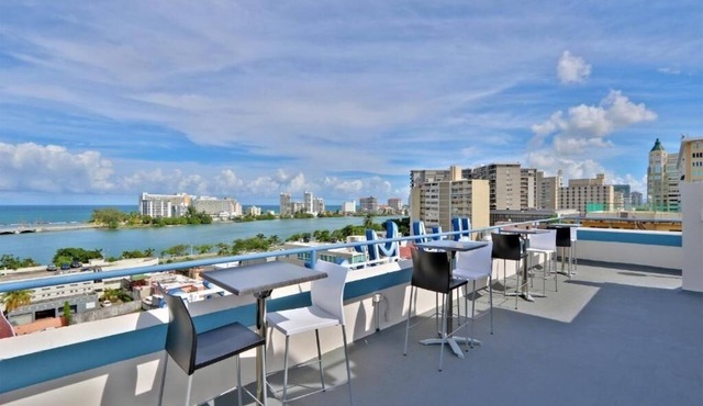 Stunning Rooftop Views Await at This Relaxing Room in Historic Miramar