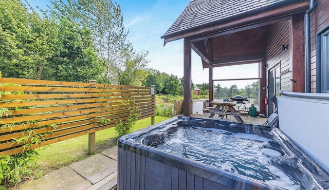 Stunning two storey contemporary lodge on the edge of the lake.
