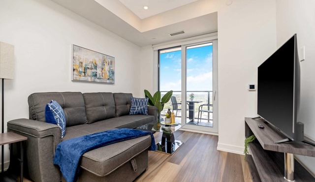 Stylish 1BR Condo w Balcony & Skyline Views