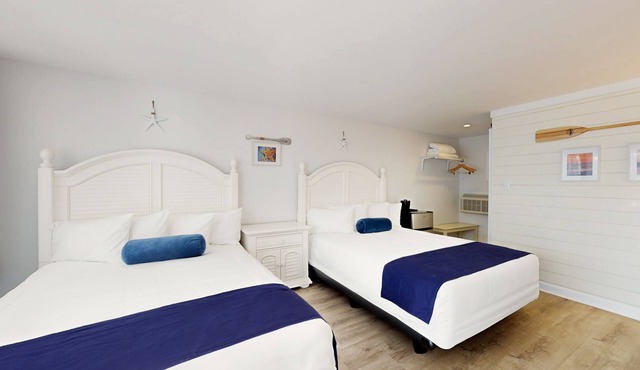 Stylish Double Queen Room for Families and Friends
