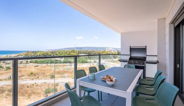 Stylish Seaside Escape with Balcony
