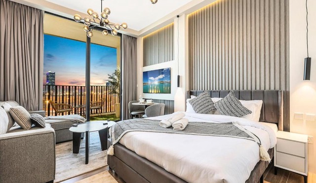 Stylish Studio in JVC with Pool, Gym, Balcony & Modern Comforts