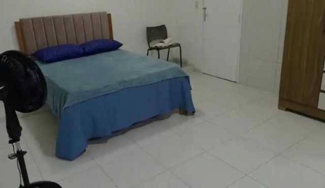 Suíte com ar condicionado e garagem