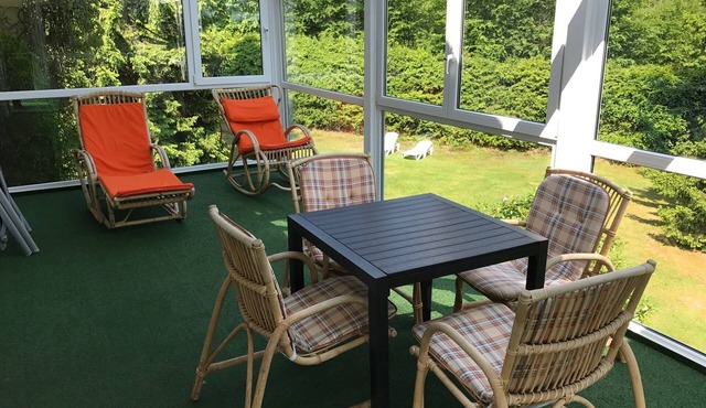 Suite for up to four people with conservatory and balcony