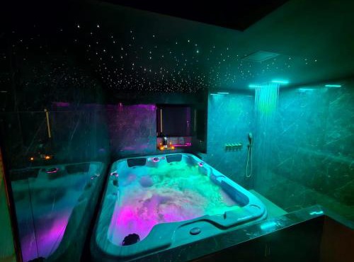 Suite romantique avec jaccuzzi - proche des lacs - La secrète room