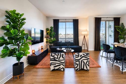 Sun-Drenched Hideaway with Dual Balcony, Pool, & Gym 215