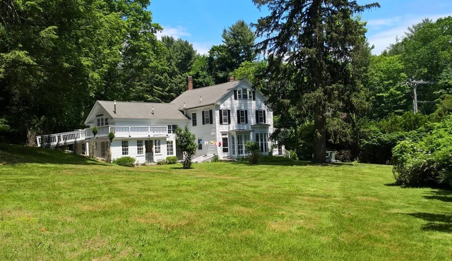 Sunny Colonial in Washington Green across from Mayflower Inn