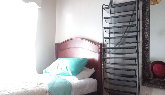 Sunny Window by the Bed