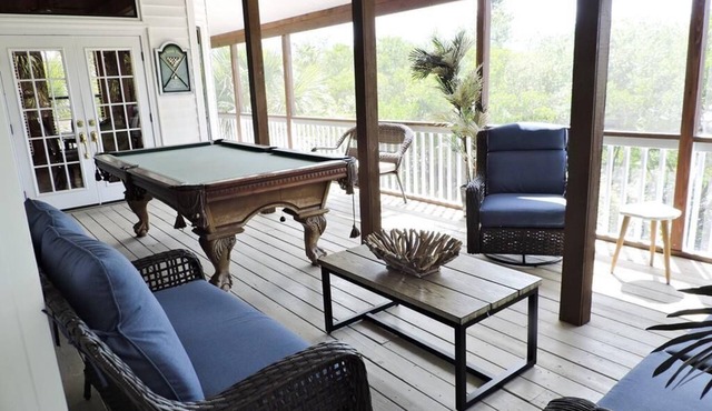 Sunset Gulf views from your porch with a private dock.