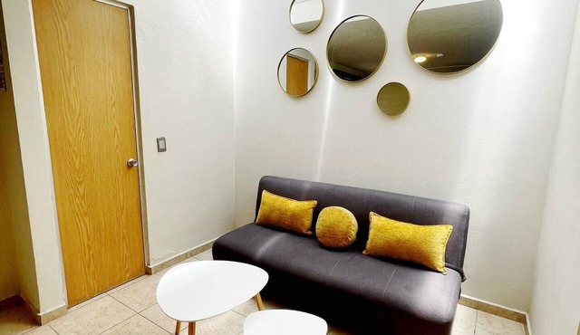Super clean house with AC, equipped, amenities, desk and garage.