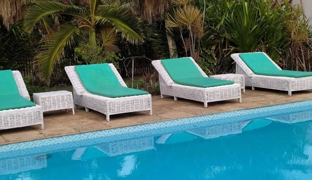 Superb beach villa with pool and large tropical garden