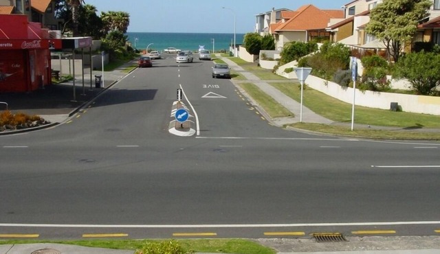 Superb beachside house, spot the surf rolling in.