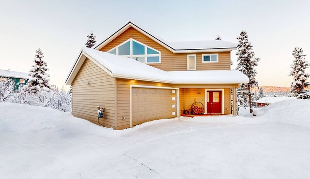 Sweeping mountain and ski view escape near the city center with a hot tub