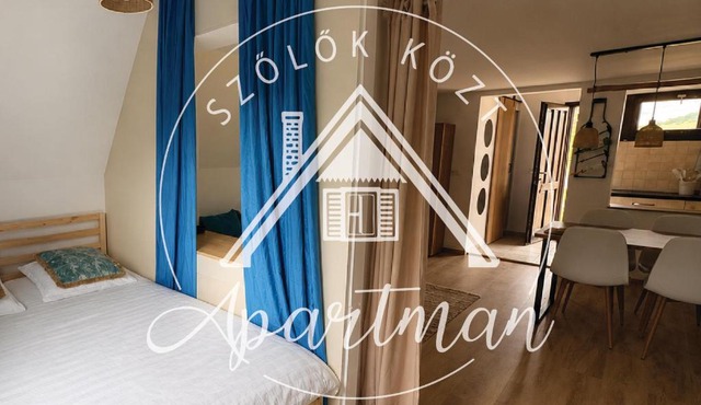 Szőlők közt Apartman