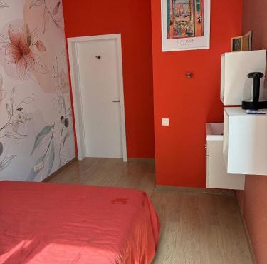 Tastefully-decorated bedroom with garden access