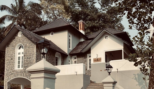 "Thalimala Bungalow, Experience A Vintage Colonial Charm in a Tea-Scaped Haven"